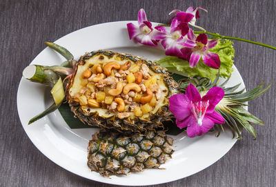 High angle view of flowers in plate on table