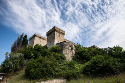 Low angle view of historic building against sky