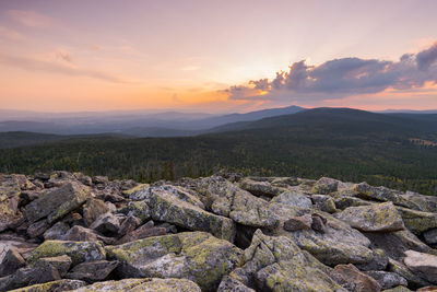 Scenic view of mountains against sky during sunset