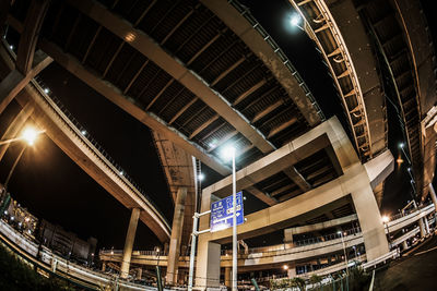 High angle view of illuminated buildings in city at night