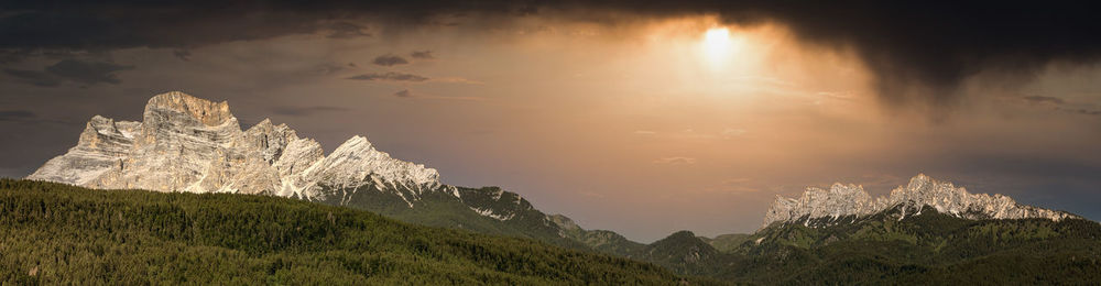 Scenic view of mountains against sky during sunset