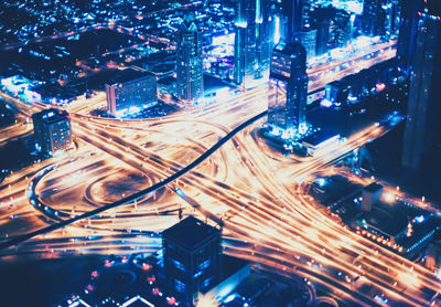 High angle view of traffic on city street at night