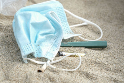 High angle view of shoe on sand