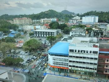 High angle view of buildings and street in city