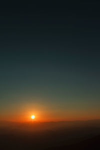 Scenic view of landscape against sky during sunset