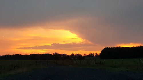 Scenic view of landscape at sunset