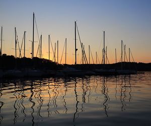 Silhouette of marina at sunset