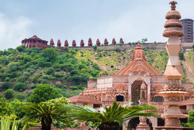 Artistic red stone jain temple at morning from unique angle