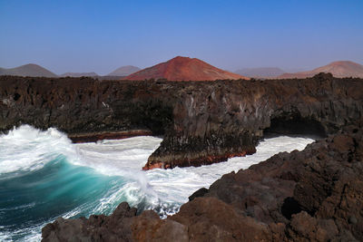 Scenic view of sea against clear sky