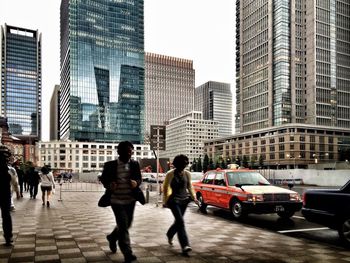 People walking on city street