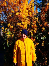 Portrait of teenage girl standing in autumn