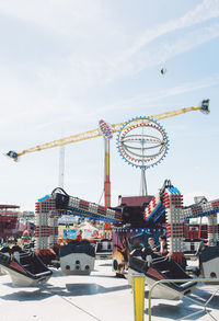 Ferris wheel against sky in city