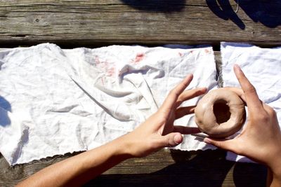 Close-up of hand working with clay