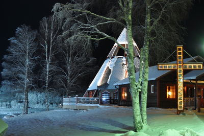 House in winter at night