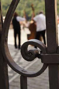 Close-up of metal railing against blurred background