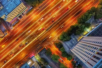 High angle view of illuminated cityscape at night