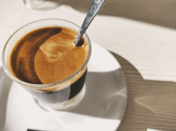 High angle view of coffee cup on table