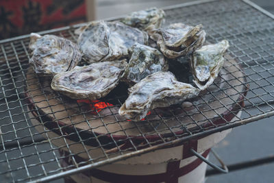 Close-up of meat on barbecue grill