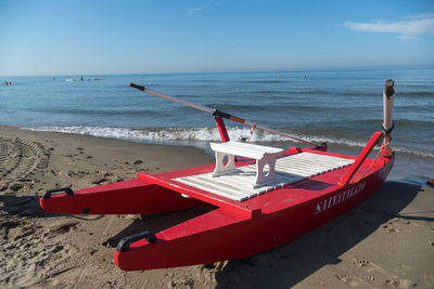 Rescue rowing catamaran on the sand