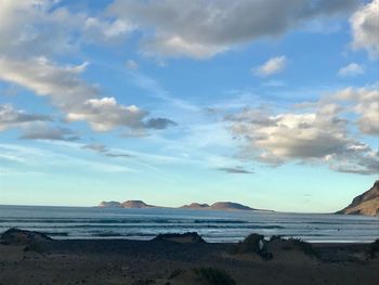 Scenic view of beach against sky