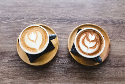 High angle view of cappuccino on table