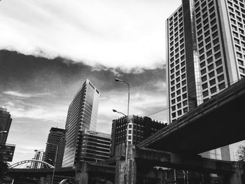 Low angle view of buildings in city against sky