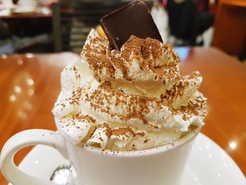 Close-up of coffee served on table