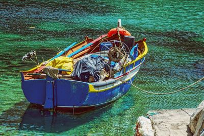 High angle view of abandoned boat moored on shore