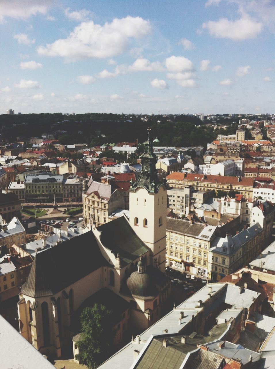 building exterior, architecture, built structure, cityscape, crowded, city, residential district, sky, residential structure, high angle view, residential building, roof, town, townscape, house, cloud - sky, day, cloud, community, outdoors