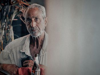 Portrait of senior man looking away