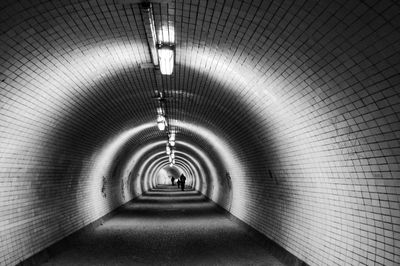 Interior of illuminated subway station