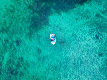 High angle view of helicopter floating on sea