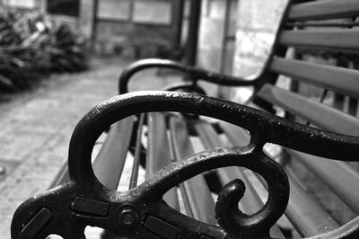 Close-up of bench at park