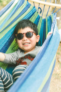 Low angle view of woman in sunglasses