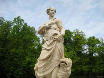 Low angle view of statue against sky