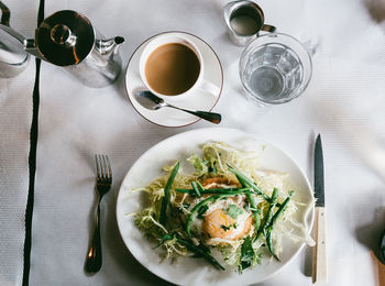 High angle view of breakfast served on table