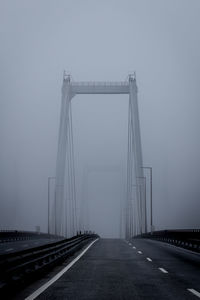 Bridge against sky during foggy weather