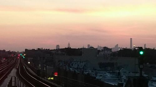 Train on road at sunset