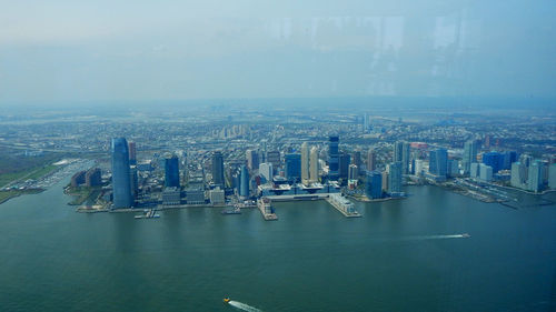 Aerial view of city at waterfront