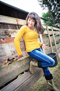 Portrait of a smiling young woman outdoors