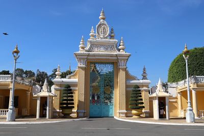 View of temple building against blue sky