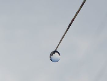 Low angle view of cables against clear sky