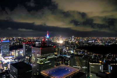 High angle view of illuminated cityscape against sky at night. tokyo japan 