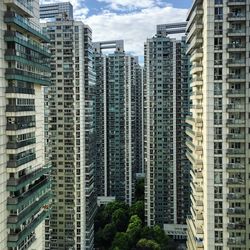 Skyscrapers in city against sky