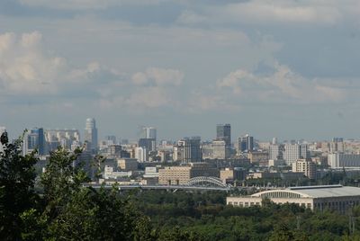 Buildings in city against sky