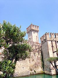 Low angle view of built structure against clear sky