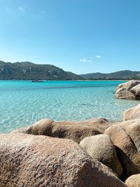 Scenic view of sea against blue sky