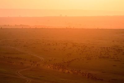 Scenic view of landscape against sky during sunset