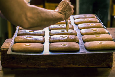 Close-up of person preparing food