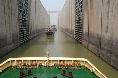 Boats sailing in canal